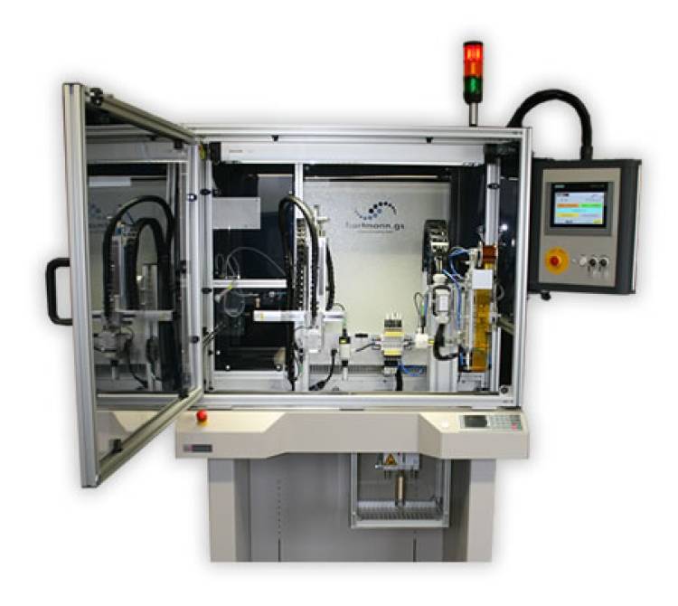 Inline Bügellötsystem auf ASYS Bandsegment für präzise Lötprozesse in integrierten Fertigungslinien.